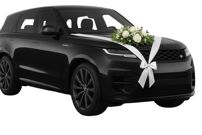 Range Rover als Hochzeitsauto geschmückt mit Blumen und Schleife